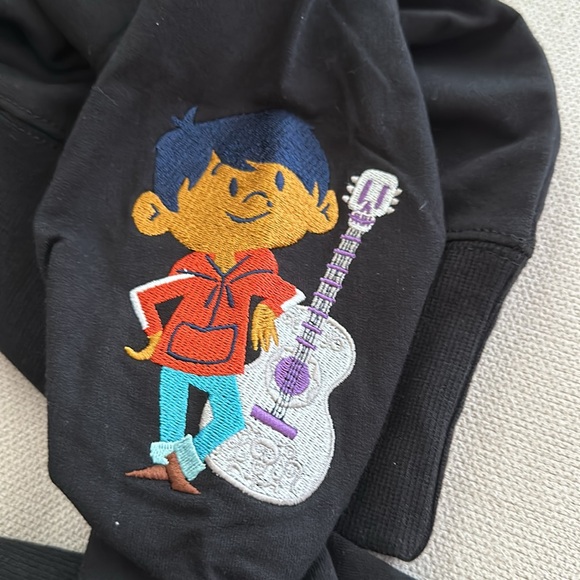 DISNEY COCO BLACK LONG SLEEVE EMBROIDERED REMEMBER ME TOP SMALL NEW - Picture 11 of 11